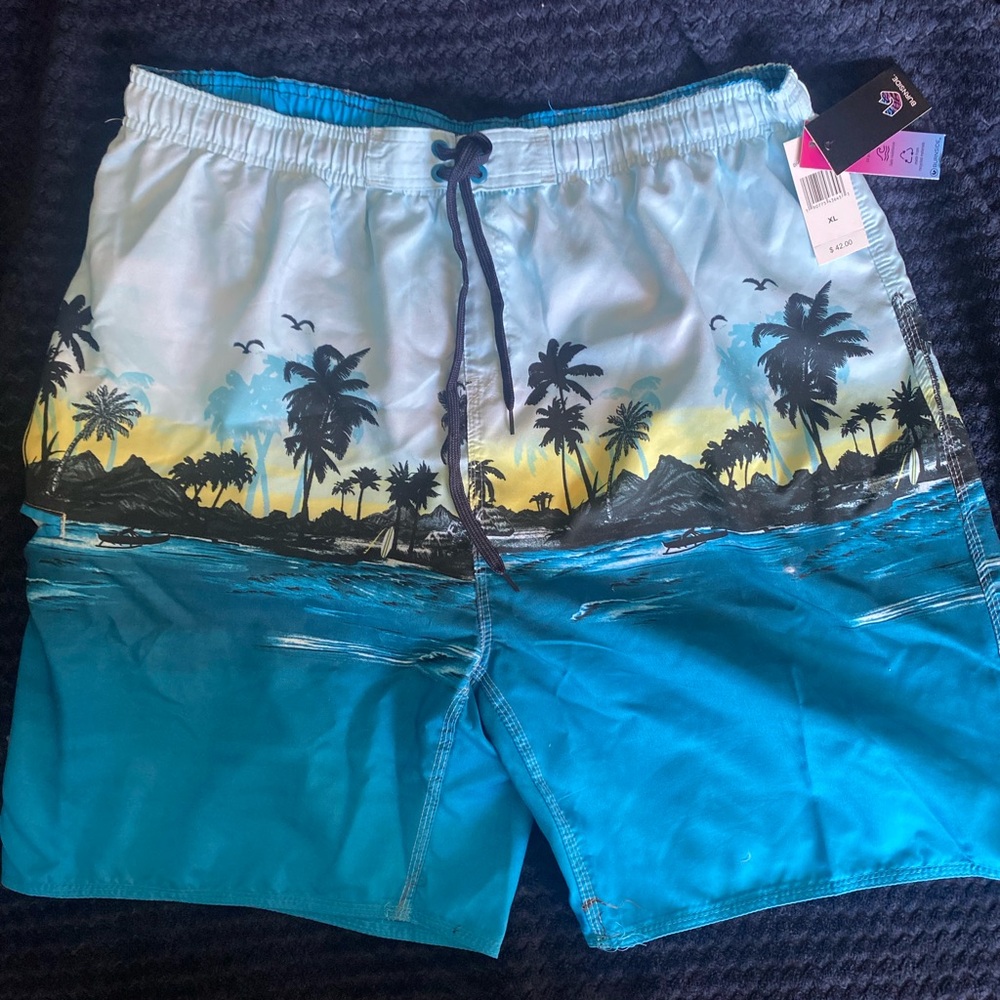 NWT XL swim trunks by burnside, w/side zipper and lining. Microfiber feel.